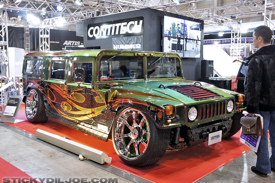 Wild slammed and bagged Hummer H1 also note the fancy Louis Vuitton man 