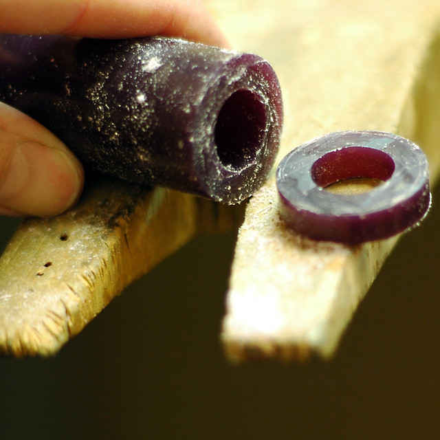 The wax gets sliced with a saw or in a cutting box