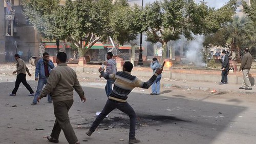 Egyptians clash with authorities in Suez amid anger over the deaths of 74 people at a soccer match in Port Said on February 1, 2012. Many people blamed the military for the deaths. by Pan-African News Wire File Photos