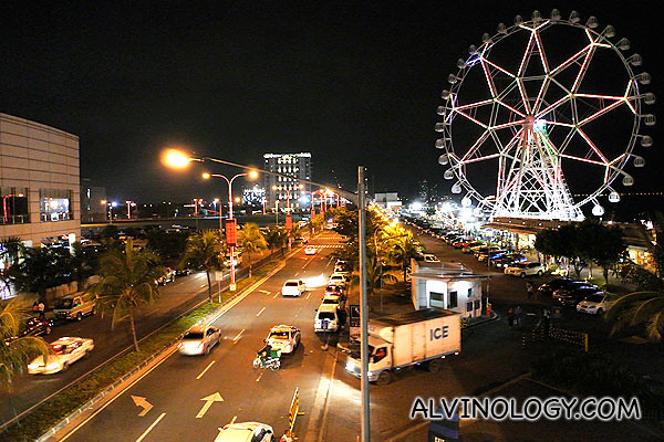 SM Mall of Asia on the left and Manila Bay on the right