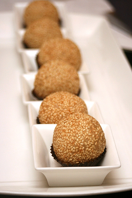 Sesame coated glutinous rice balls with red bean paste and champagne
