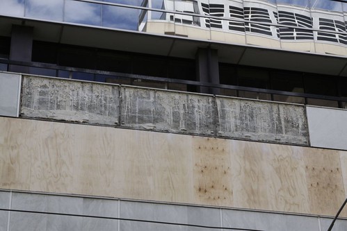 Removed marble panels on the Flinders Lane frontage of 447 Collins Street - intentionally removed, not fallen off