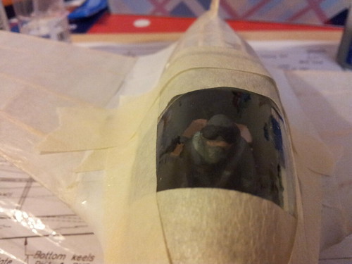 Me163 canopy taped in place while glue dries
