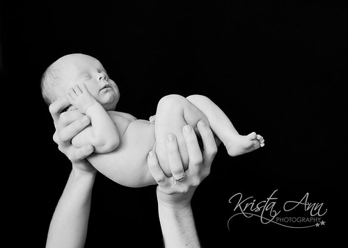 holding-baby-up-BW-facebook