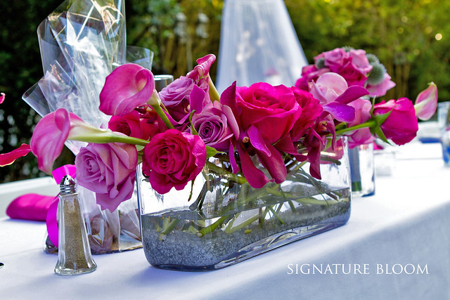 When looking for head table ideas for your reception these modern flower 