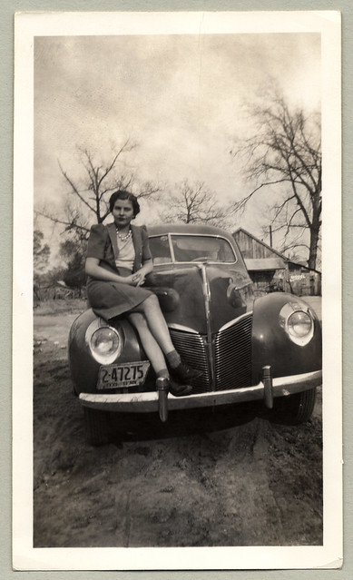 1940 Mercury Eight A young woman dressed in a lady's suit sitting on the