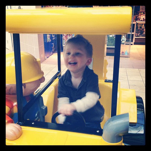 Loving his first ride in the mechanical car. #masterquinn #playtime