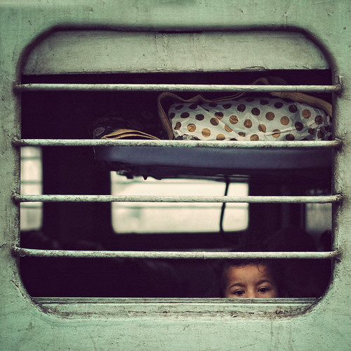 The Little Girl at the Window by Chot Touch