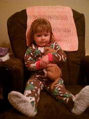 Sydney with Little Kitty, a stuffed animal from Jeff's early years