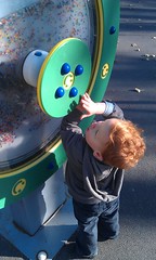 Tom spinning in playground