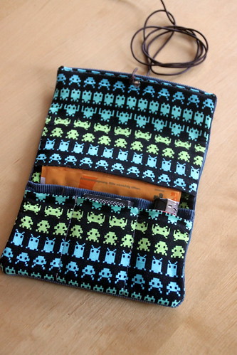 space invaders tobacco pouch.