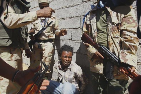 Africans being tortured by the CIA-trained rebels now roaming the North African state of Libya. The rebels were supported and installed by the imperialist states. by Pan-African News Wire File Photos