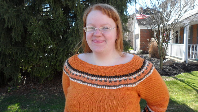 Slipped stitch colorwork yoke bohus stickning style orange and natural colored shetland wool