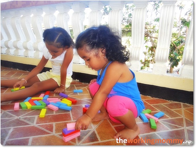 the girls building blocks