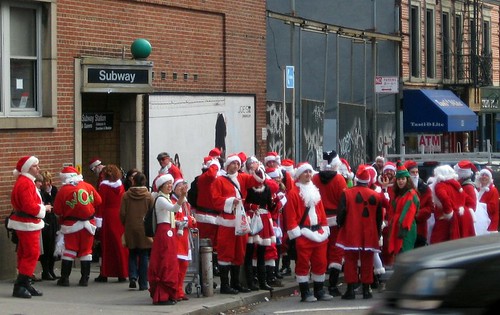 Santas head underground in NYC (by: Eric Jaeger, creative commons license)
