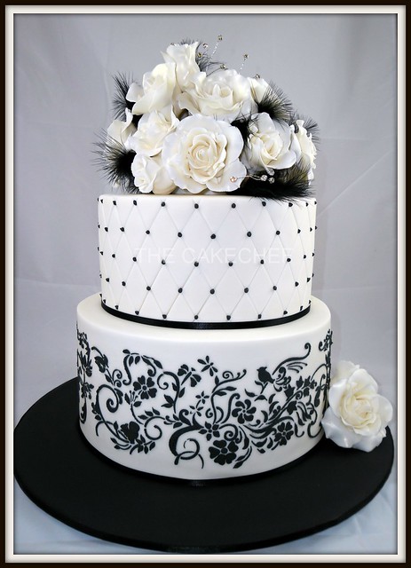 Roses feathers Wedding cake 2 tier ivory black with ivory sugar roses 