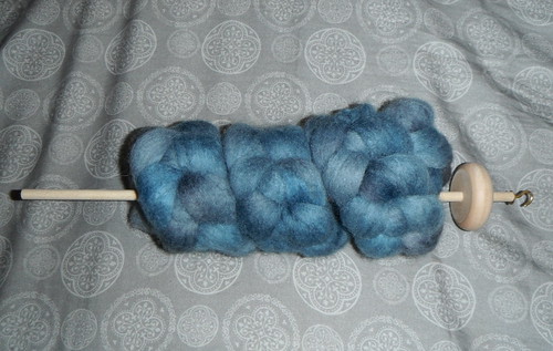 Shetland top, in oh so blue 3oz.  With homemade drop spindle