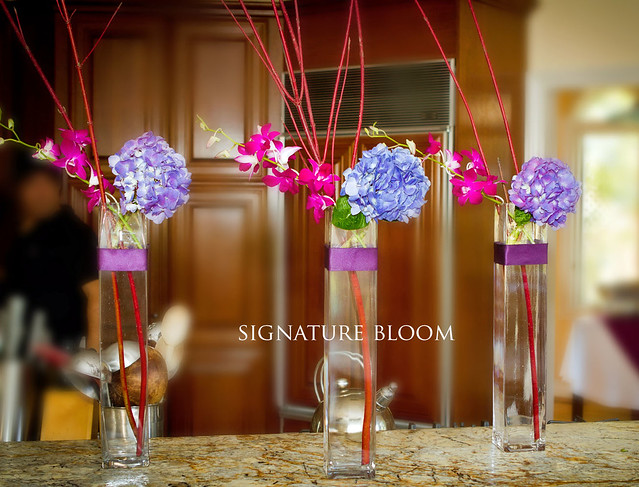 purple and green flower arrangements for weddings