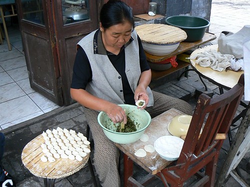 Preparing dumplings, China