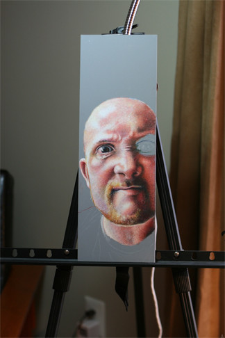 In progress colored pencil portrait entitled Surly