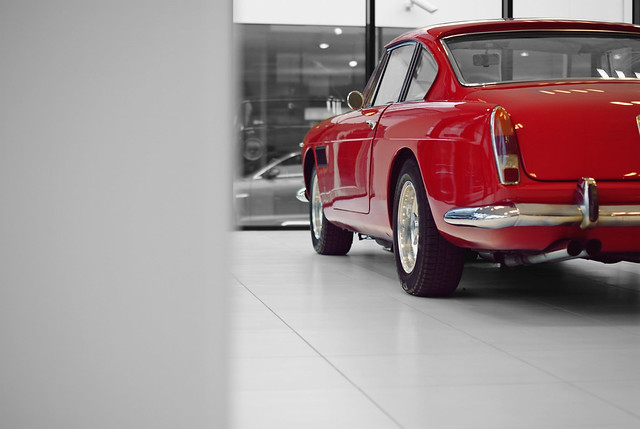 This beautiful red Ferrari 250 GTE is for sale at Kroymans in Hilversum