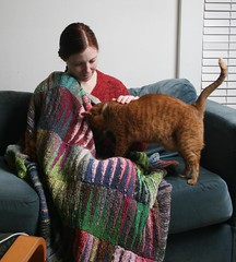 Mom, cat and blanket