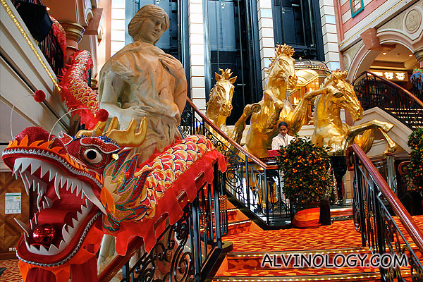 Chinese dragon and three golden horses