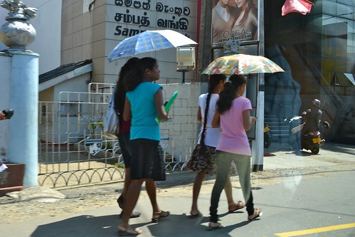 Umbrellas are used all day long: to protect from both the sun AND the sudden rain showers.