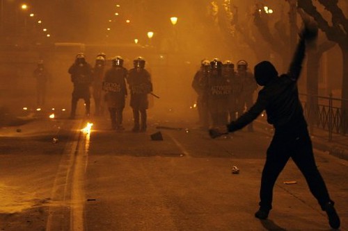 Greek youth clash with riot police in the aftermath of a new vote for further austerity measures imposed by the international financial institutions and the imperialist states. The government fell as a result of the crisis. by Pan-African News Wire File Photos