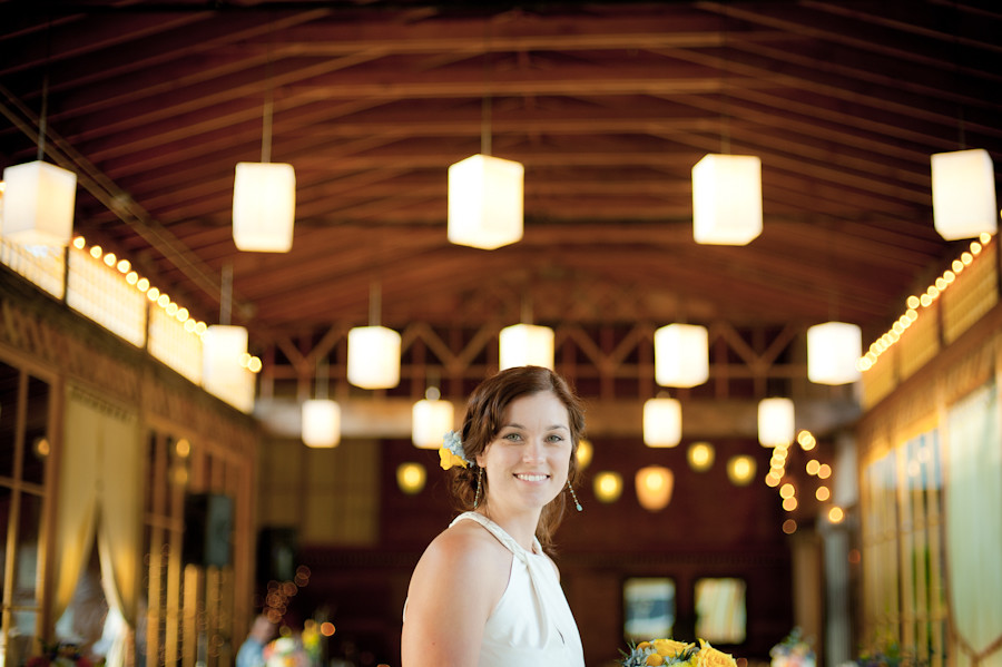 Bride inside the Apple House at Mt. Hood Organic farms with lanterns in background
