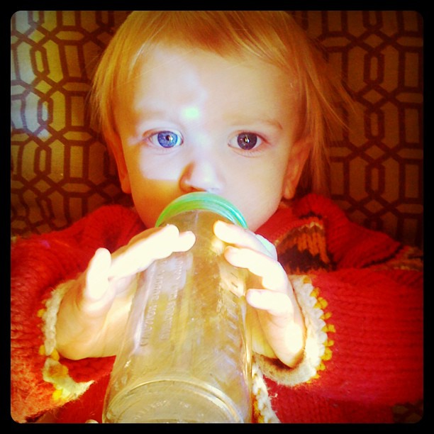 Some good habits start early - tea in her bottle.