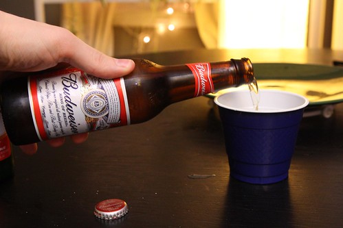 Pouring American Budweiser For Blind Tasting