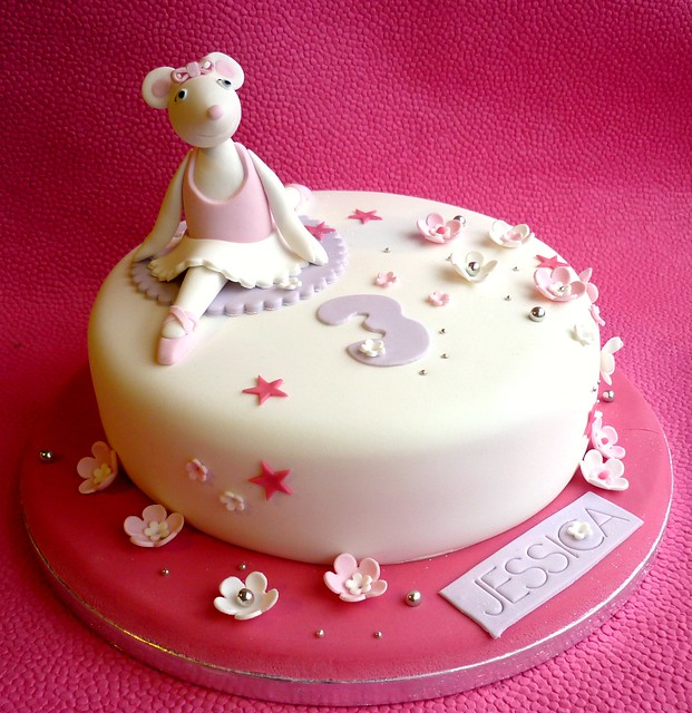 A cake for an Angelina Ballerina fan The topper is handmade and placed on a