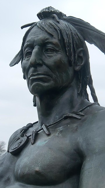 Bronze of a Native American Warrior by Rudolf Siemering 1897 CE in Eakins Oval overlooks visitors to the Philadelphia Museum of Art