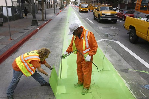 Painting a bicycle lane green