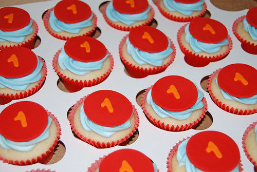 1st birthday cupcakes blue red and orange