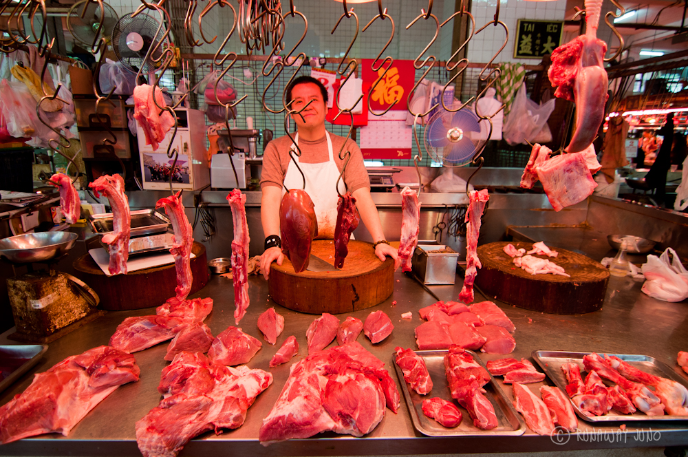 A butcher at Red Market MAcau