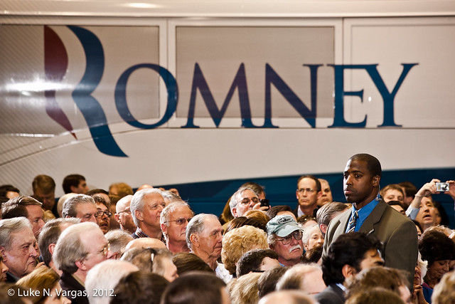 Romney's Bodyguard Towers Over the Crowd
