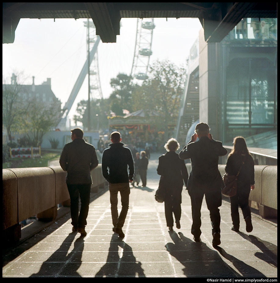 People walking towards the London Eye