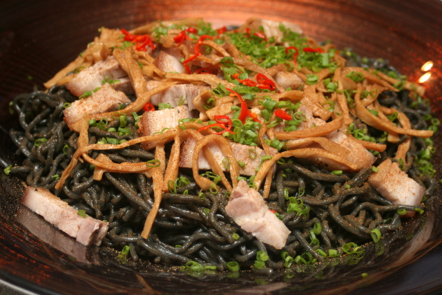 Umami Ramen (Bamboo Charcoal Noodle) served with roast pork