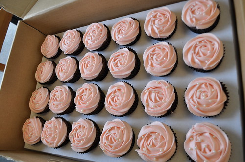 Pale pink and white wedding cupcakes Double choc mud cupcakes with pale 