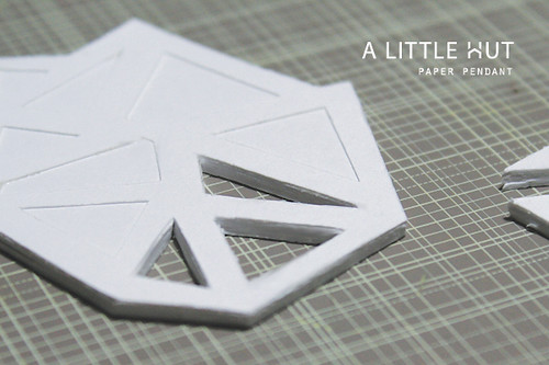 paper pendant - cutting by hand