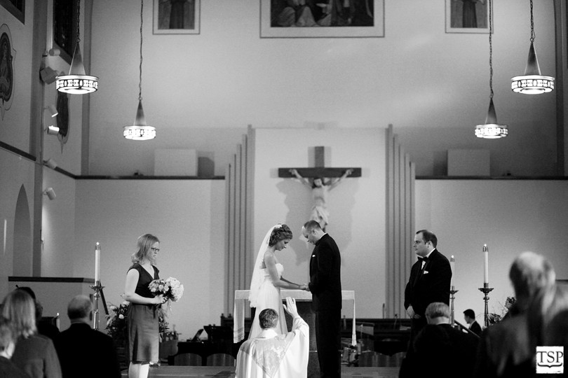 Bride and Groom Praying at Catholic Church