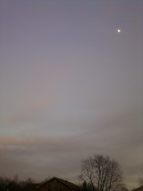 Moon amid pink clouds