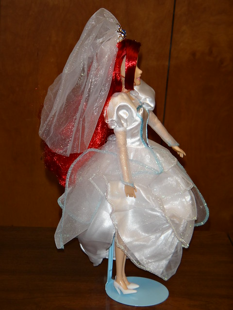 She is coreleased by Disney Theme Parks Merchandise and wedding disney theme