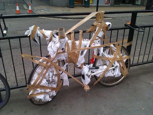 Someone's bike wrapped in toilet paper