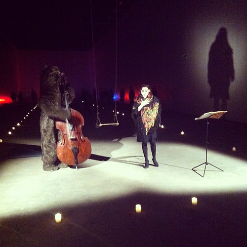 Natalia Dominguez Rangel sings and swings with a bear playing contrabass.