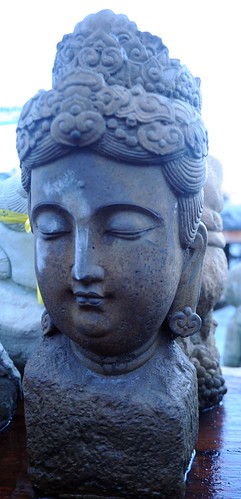 Bodhisattva bust, ornate headress and earrings, concrete, Lake City Way, Seattle, Washington, USA by Wonderlane