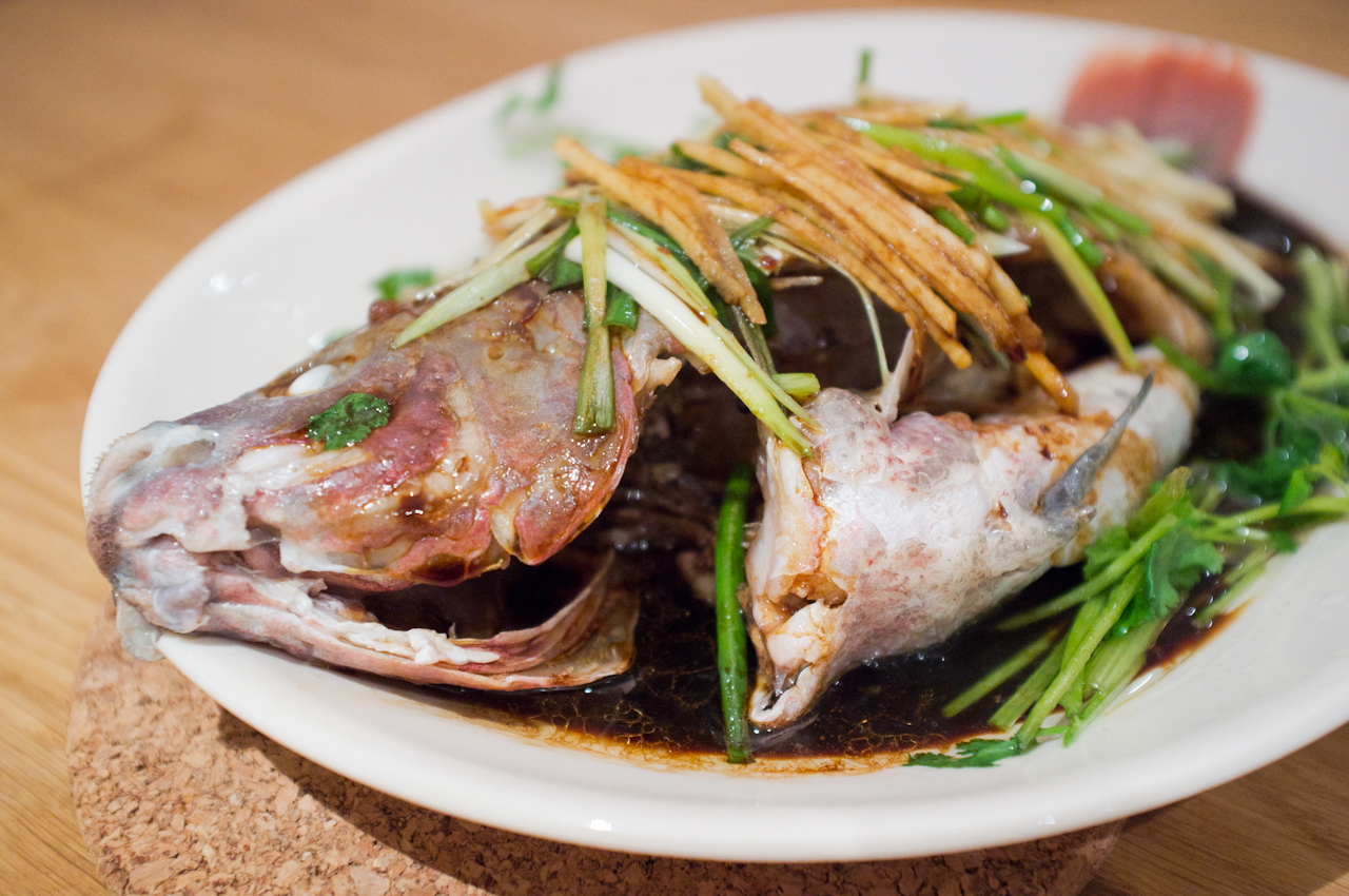 Steamed whole fish with ginger, scallions, cilantro and soy
