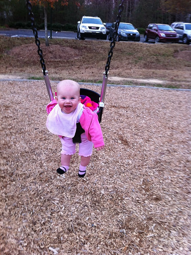 Lucy loves the swing.